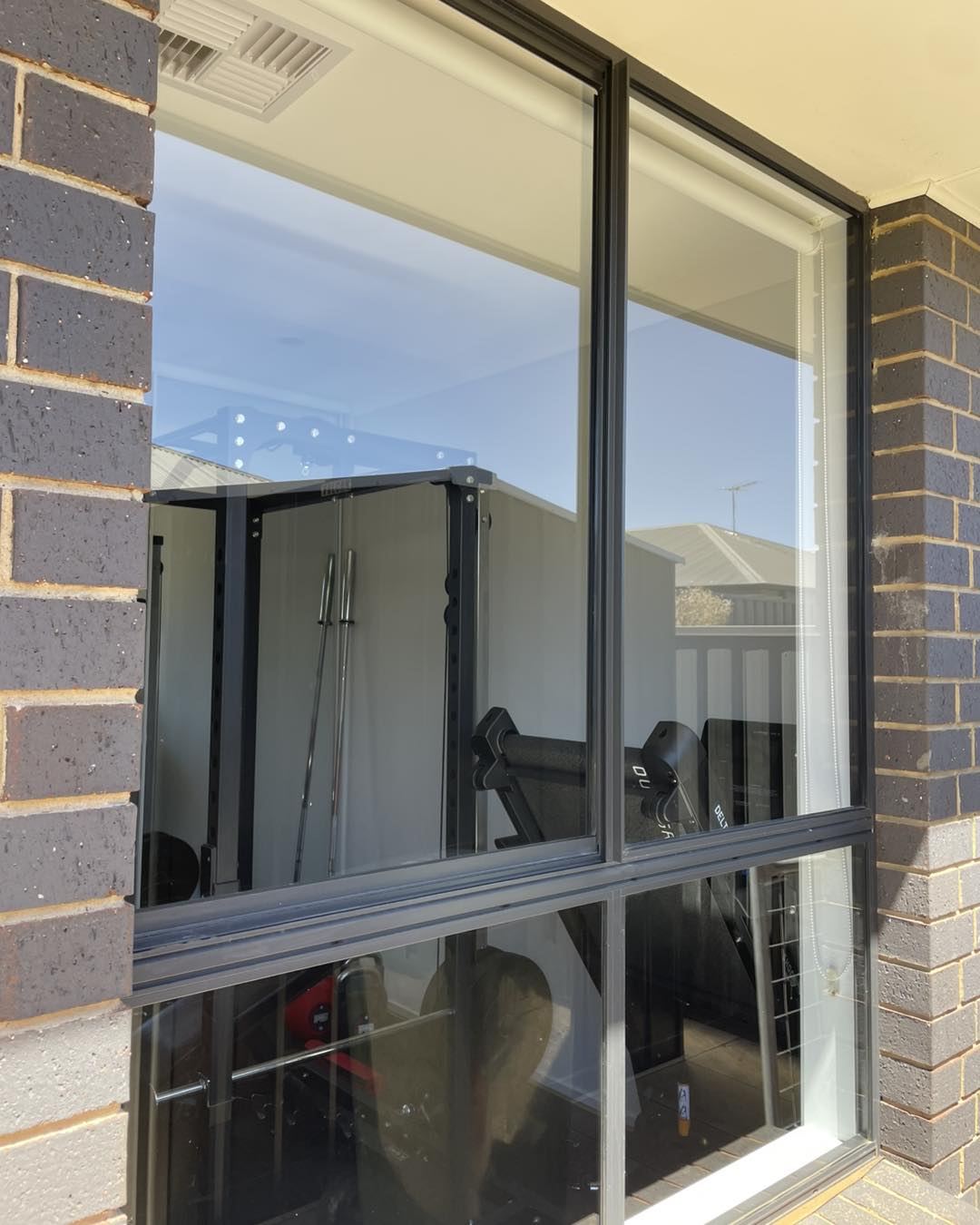 Large window framed by brickwork after cleaning
